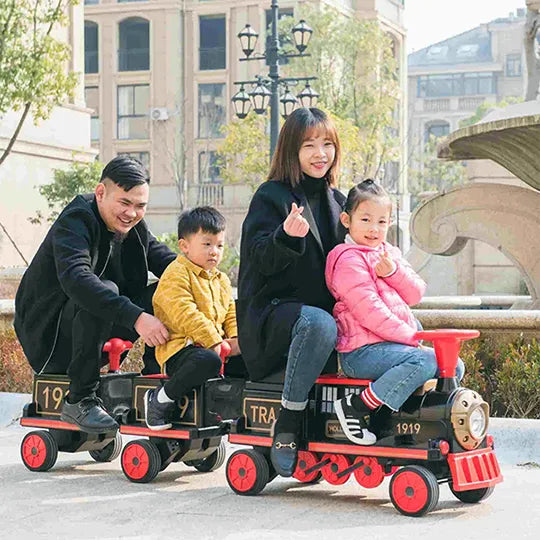 Tren eléctrico de juguete para niños con un vagón adicional